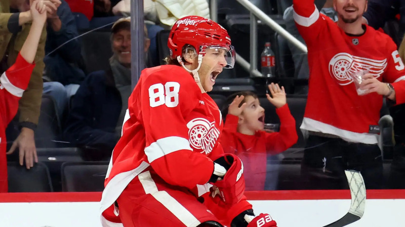 The Red Wings Soar Past Flames: Patrick Kane's Historic Night
